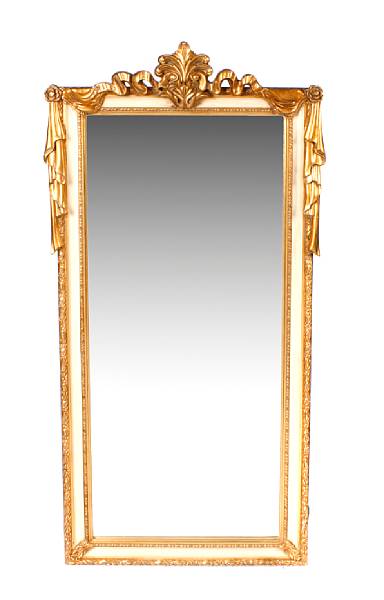 Appraisal: A Neoclassical style parcel gilt paint decorated mirror height in