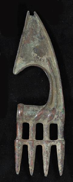 Appraisal: A Bronze Age votive axe headLuristan - BC With downcurving