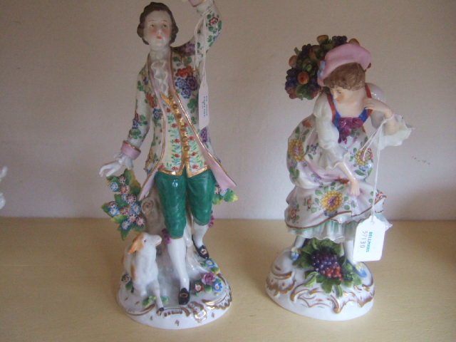 Appraisal: A pair of Continental porcelain figures early th century modelled