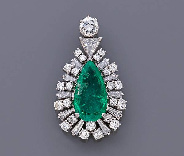 Appraisal: An emerald and diamond pendant estimated total diamond weight carats