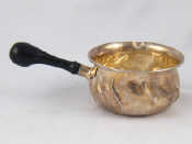 Appraisal: A Danish silver brandy saucepan Copenhagen assay with ebonised wood