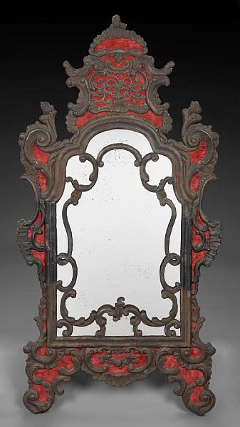 Appraisal: A Mexican Colonial silvered copper repousse decorated and velvet mirror