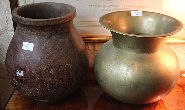 Appraisal: A BENGALI BRASS POT cm high together with a turned