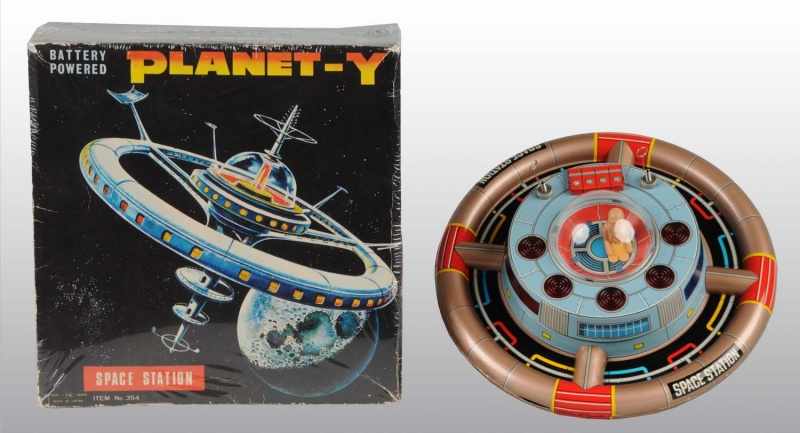 Appraisal: Tin Litho Space Station Battery-Operated Toy Description Japanese Working Planet-Y