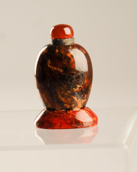 Appraisal: A th Amber Snuff Bottle on an oval base bottle