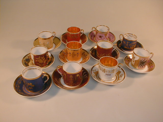 Appraisal: A harlequin set of eleven painted and gilt porcelain cups