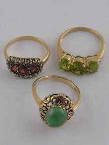 Appraisal: A mixed lot comprising three carat gold gem set rings