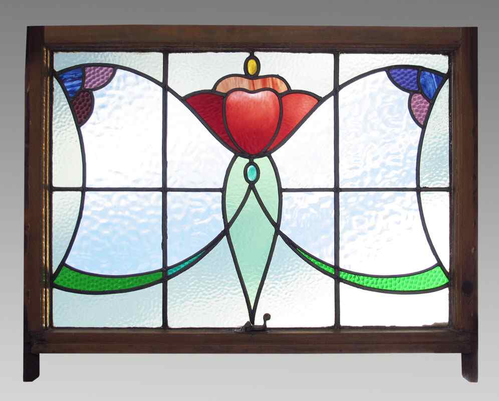 Appraisal: FIGURAL BUTTERFLY STAINED GLASS WINDOW Featuring red green and blue