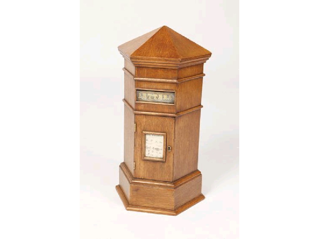 Appraisal: A LIGHT OAK COUNTRY HOUSE HEXAGONAL LETTER BOX with a