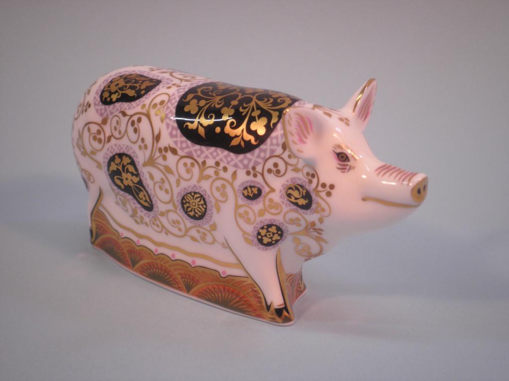 Appraisal: A Royal Crown Derby porcelain figure of the spotted pig