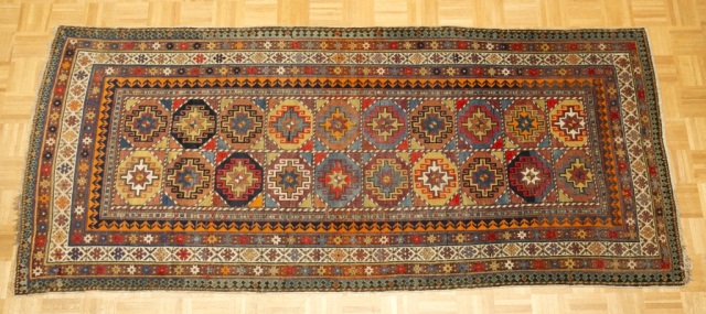 Appraisal: Kazakh-Style Runner Five borders with twenty-block geometric center Purchased at