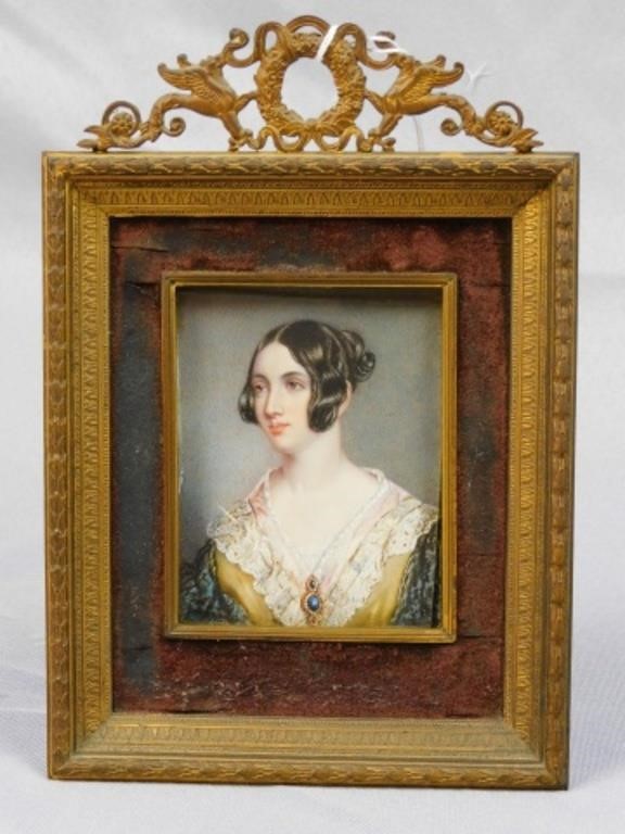 Appraisal: MINIATURE PORTRAIT OF AN ELEGANTLY DRESSED YOUNGlady early th In