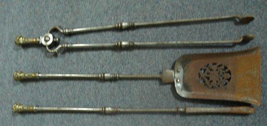 Appraisal: A set of three burnished steel fire irons with embossed