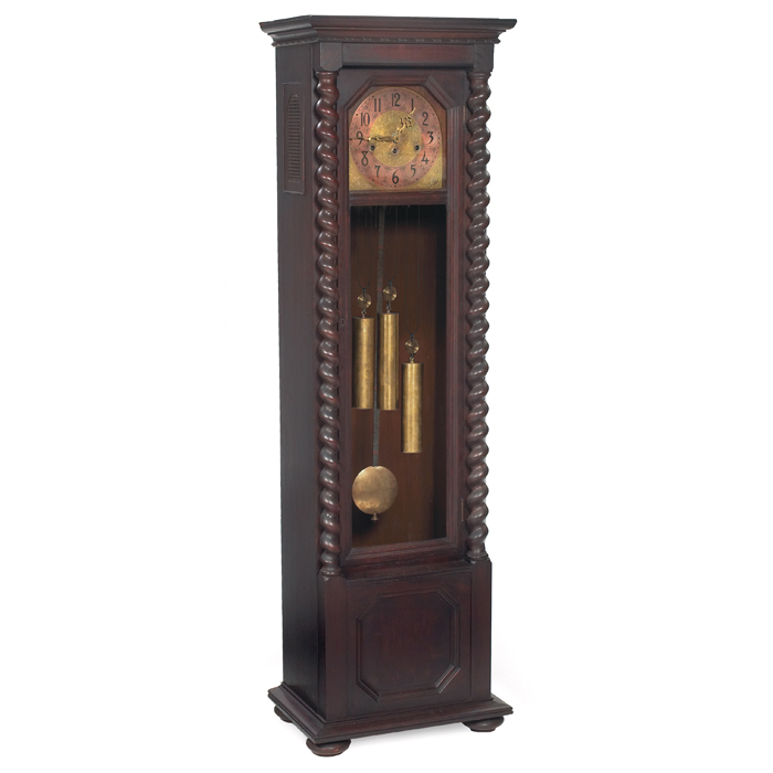 Appraisal: Colonial Clock Company hall clock barley twist columns flank a