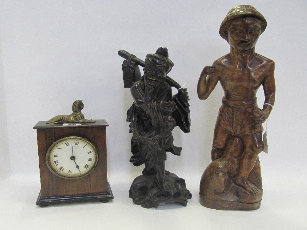 Appraisal: Carved Chinese hardwood figure of a sage another of an