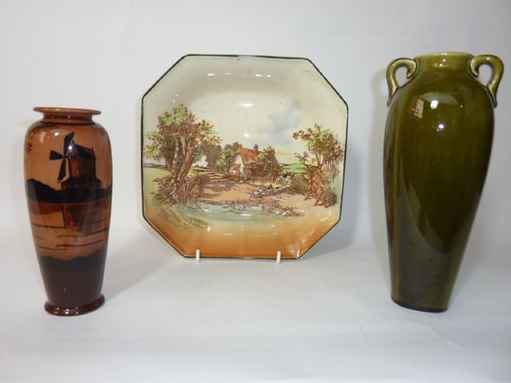 Appraisal: A slender Ault vase decorated with a windmill scene in