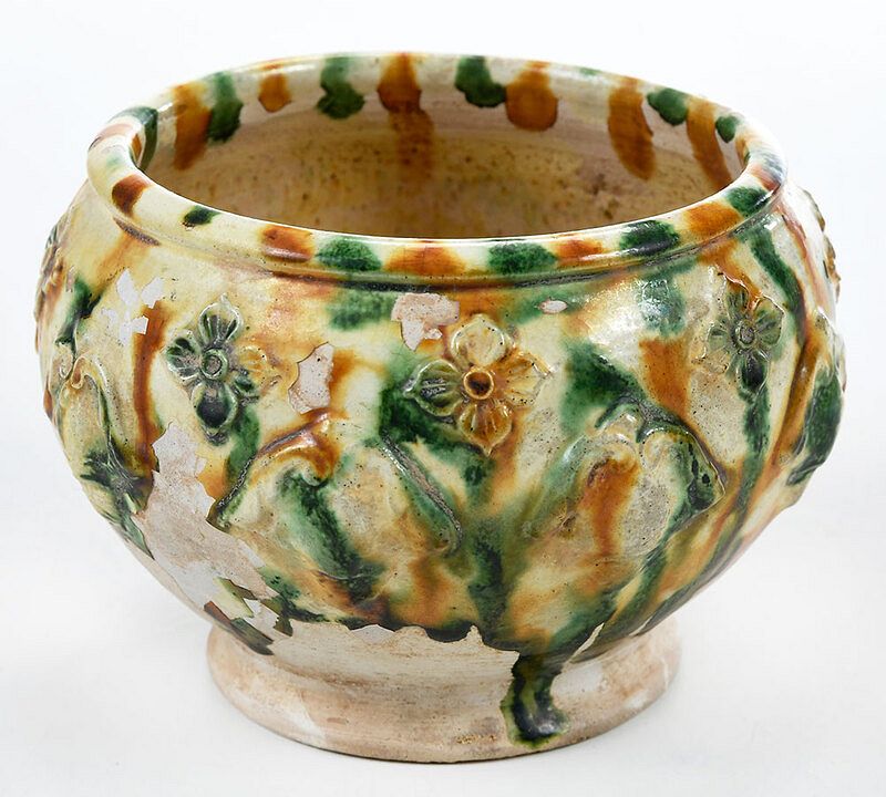 Appraisal: Chinese Sancai Glazed and Appliqued Jar Tang or Tang style