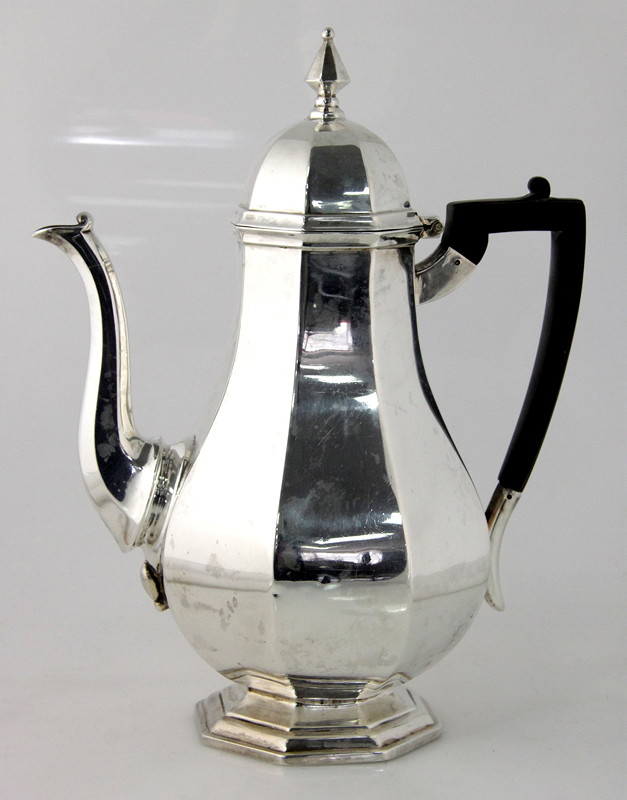 Appraisal: A Queen Anne style silver coffee pot London of octagonal