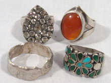 Appraisal: Four silver stone set rings