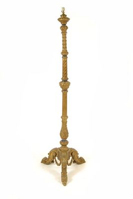 Appraisal: A continental giltwood standard lamp allover carved with acanthus on