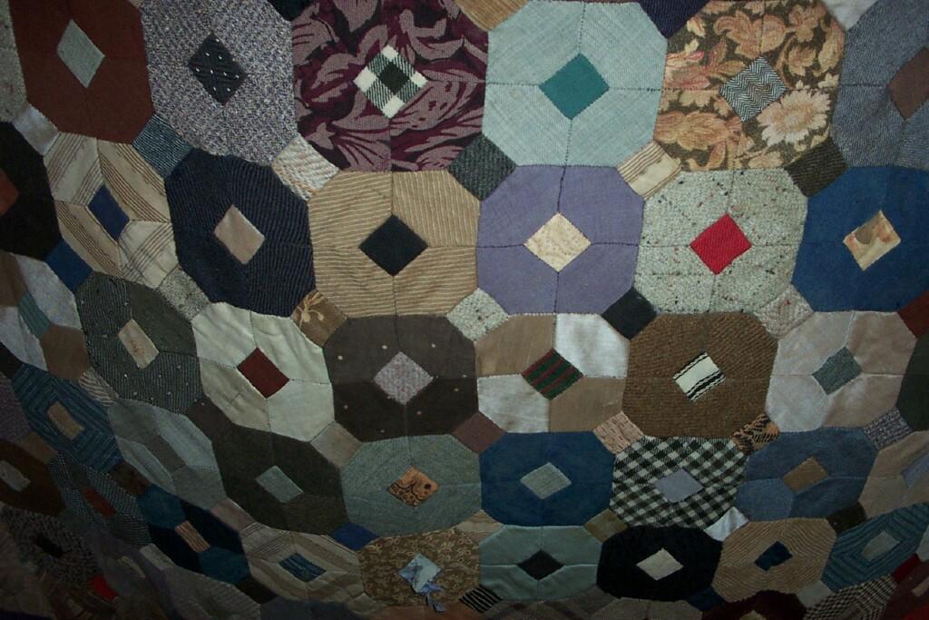 Appraisal: An early th century patchwork quilt born from hexagonal and