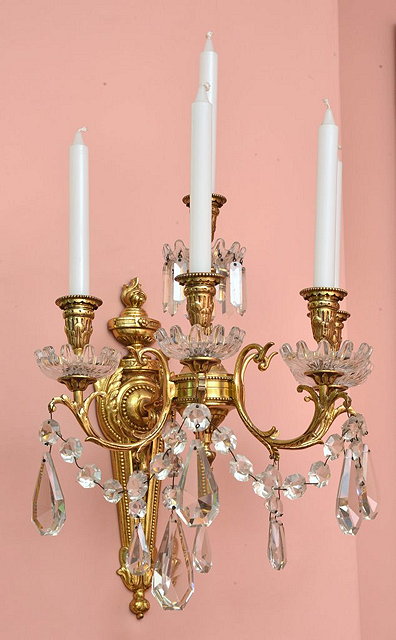 Appraisal: A PAIR OF REPRODUCTION CLASSICAL STYLE FOUR BRANCH WALL LIGHTS