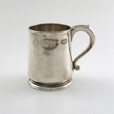 Appraisal: A George I silver mug tapering circular form scroll handle