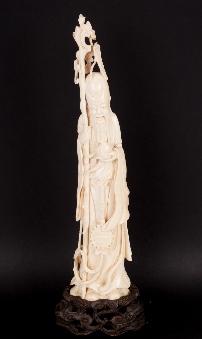 Appraisal: Japanese carved ivory immortal early th century on carved wood