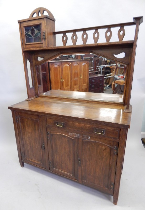 Appraisal: A late thC oak sideboard the raised mirrored back with