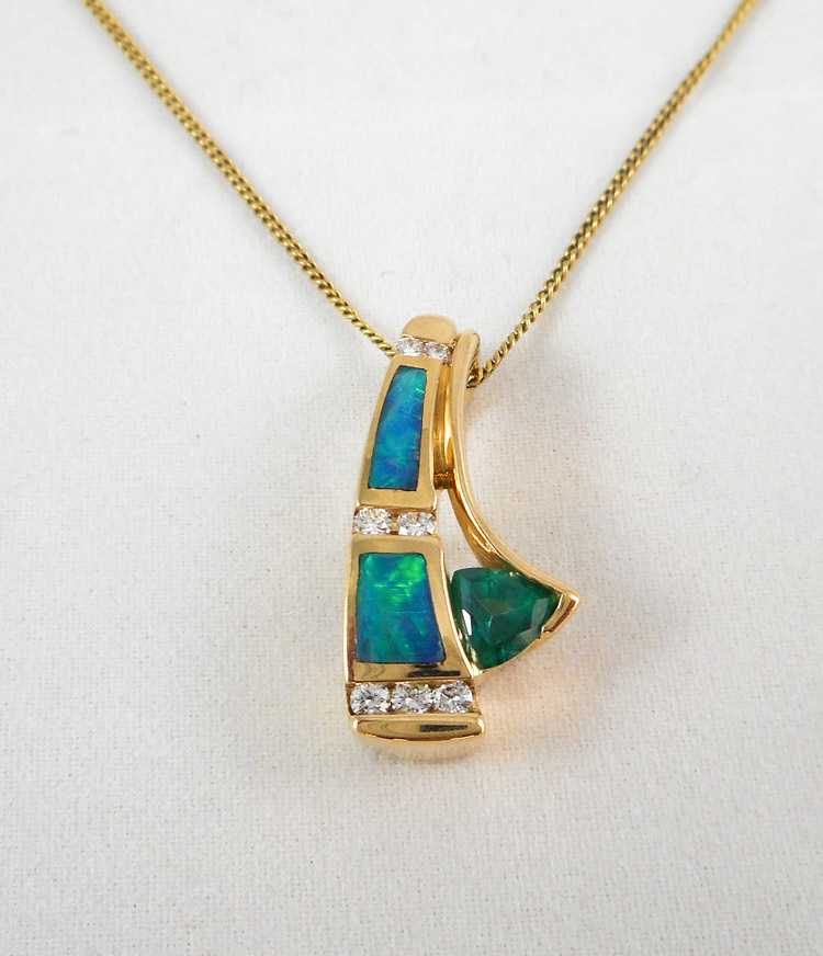 Appraisal: OPAL EMERALD AND DIAMOND PENDANT NECKLACE suspended on a -