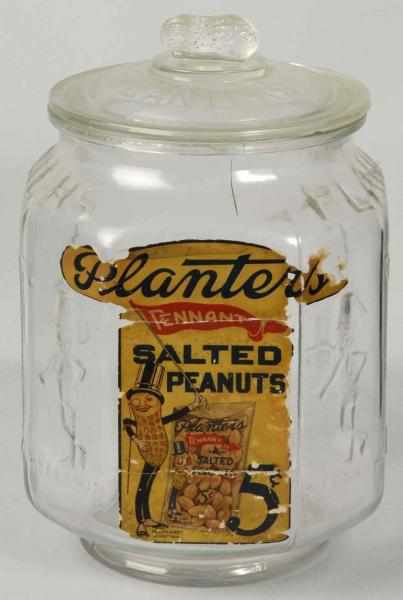 Appraisal: Octagonal Planters Peanut Jar with Original Label Description Lid is