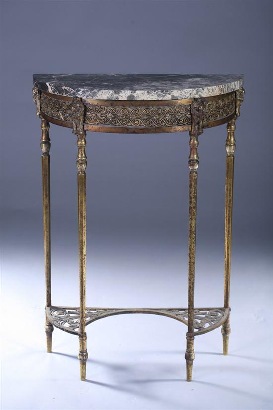 Appraisal: MARBLE-TOP GILT-METAL DEMI-LUNE CONSOLE th century Mottled cream and charcoal