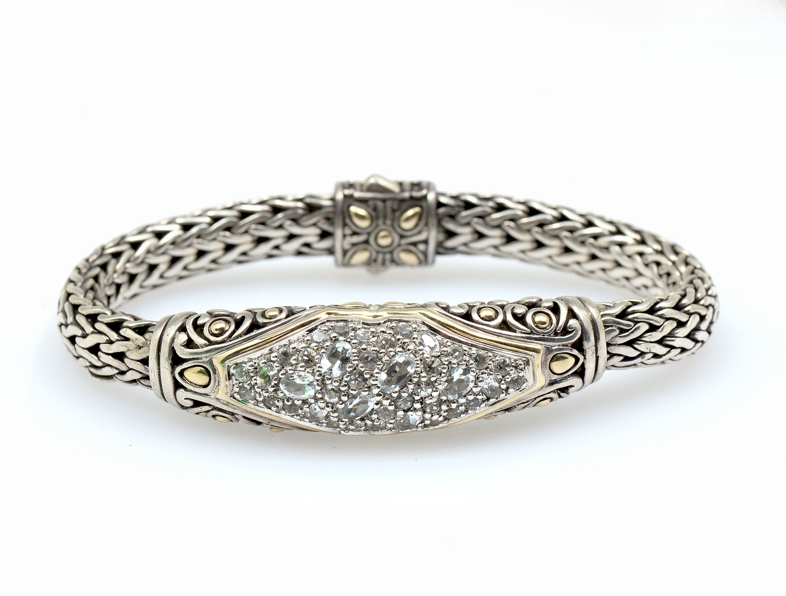 Appraisal: JOHN HARDY STERLING AND K BRACELET Sterling silver bracelet is