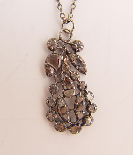 Appraisal: ROSE CUT DIAMONDS IN STERLING NECKLACE Sterling silver pendant contains