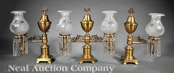 Appraisal: An American Classical Gilt Bronze Argand Lamp Suite early th