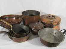 Appraisal: Eleven copper cooking vessels being five saucepans two frying pans