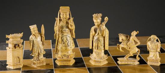 Appraisal: Chinese figural ivory carved chess set Opposing forces in natural