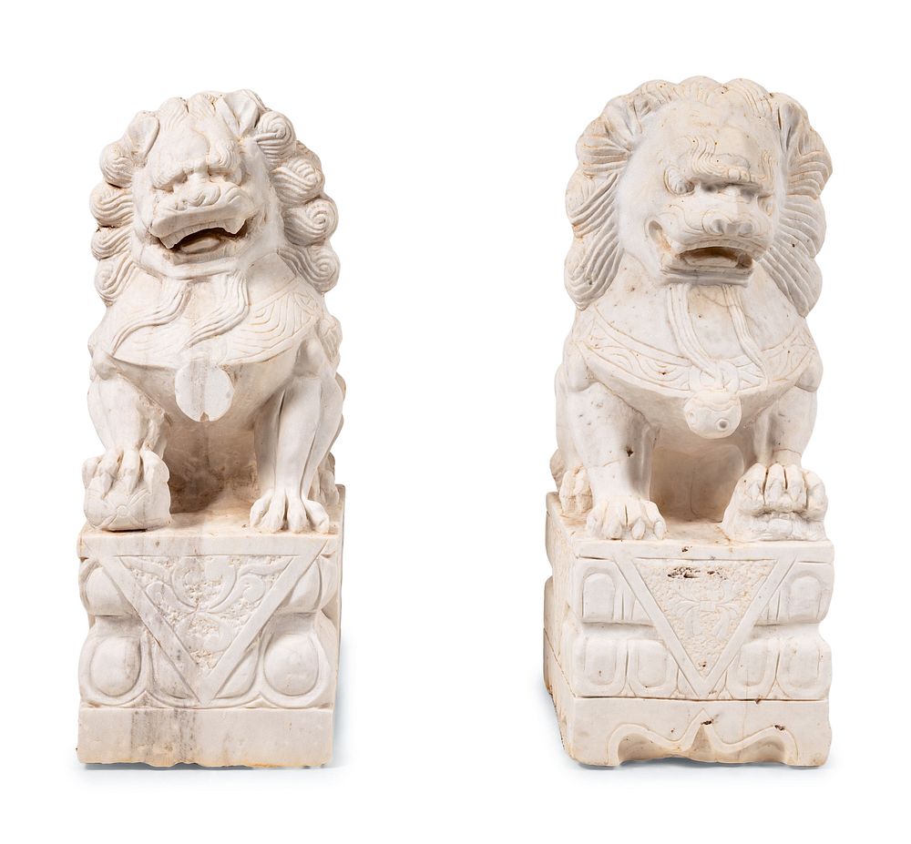 Appraisal: A Pair of Chinese Carved Marble Buddhistic Lions A Pair