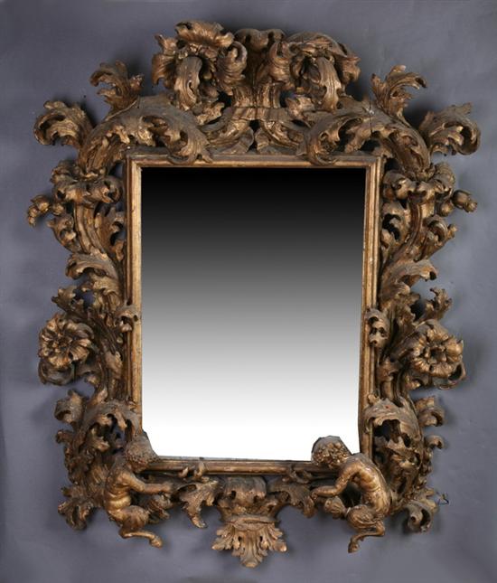 Appraisal: ITALIAN BAROQUE CARVED GILT-WOOD PALACE MIRROR th century Elaborate high-relief