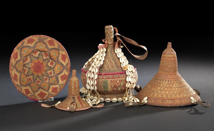 Appraisal: Collection of Four Colorful Harari Baskets Ethiopia including a leather-bound