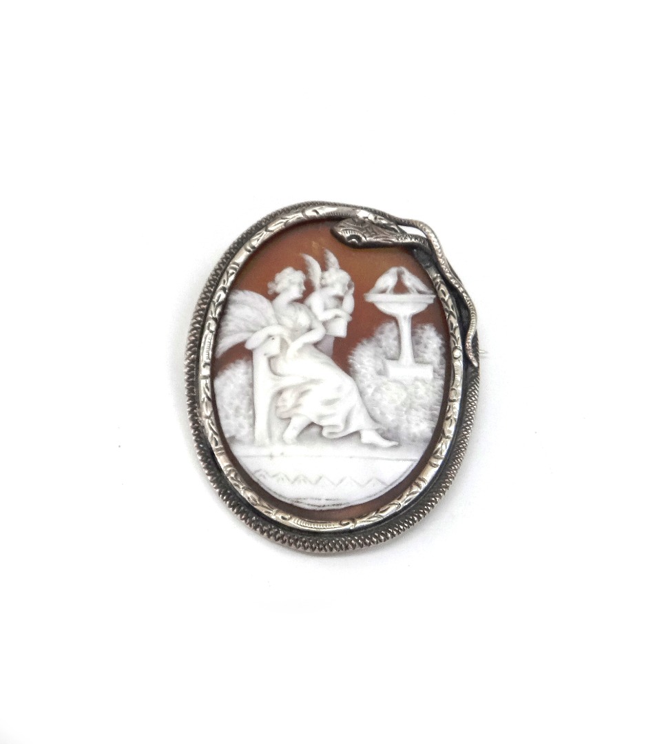 Appraisal: A Victorian shell cameo brooch depicting Cupid and Psyche in