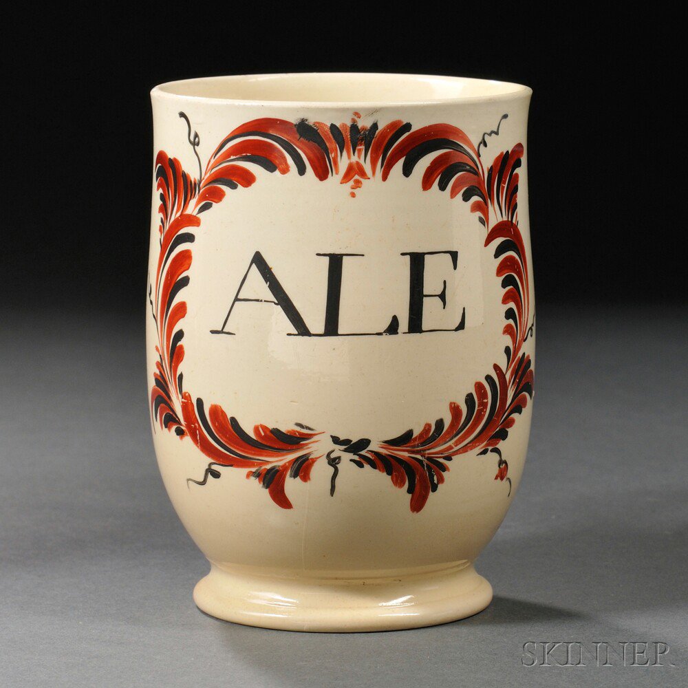 Appraisal: Staffordshire Cream-colored Earthenware Tankard England c enamel decorated in black