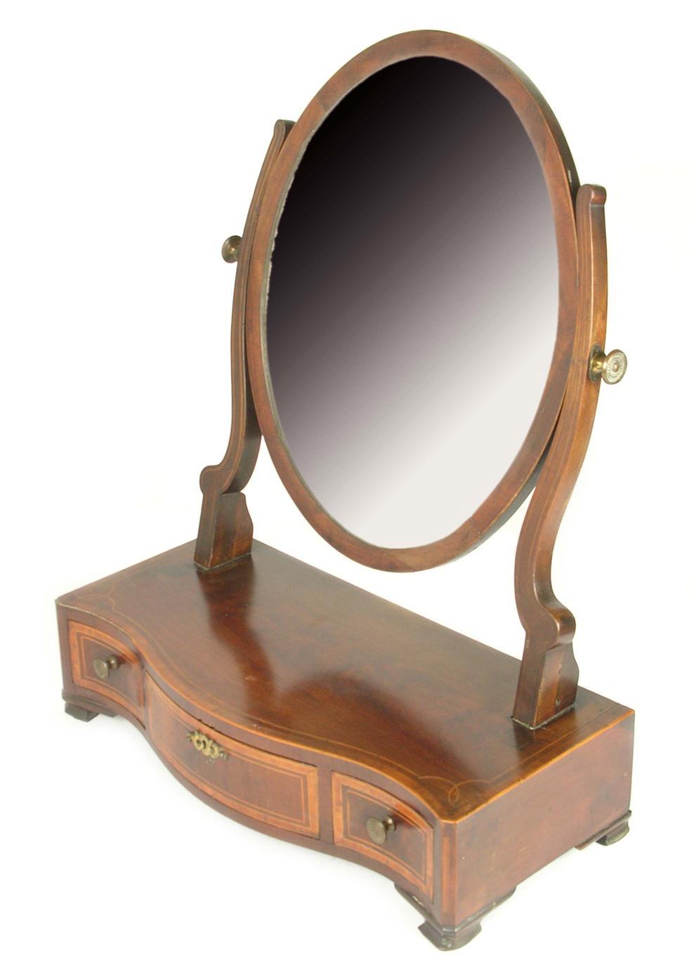 Appraisal: A George III mahogany toilet mirror