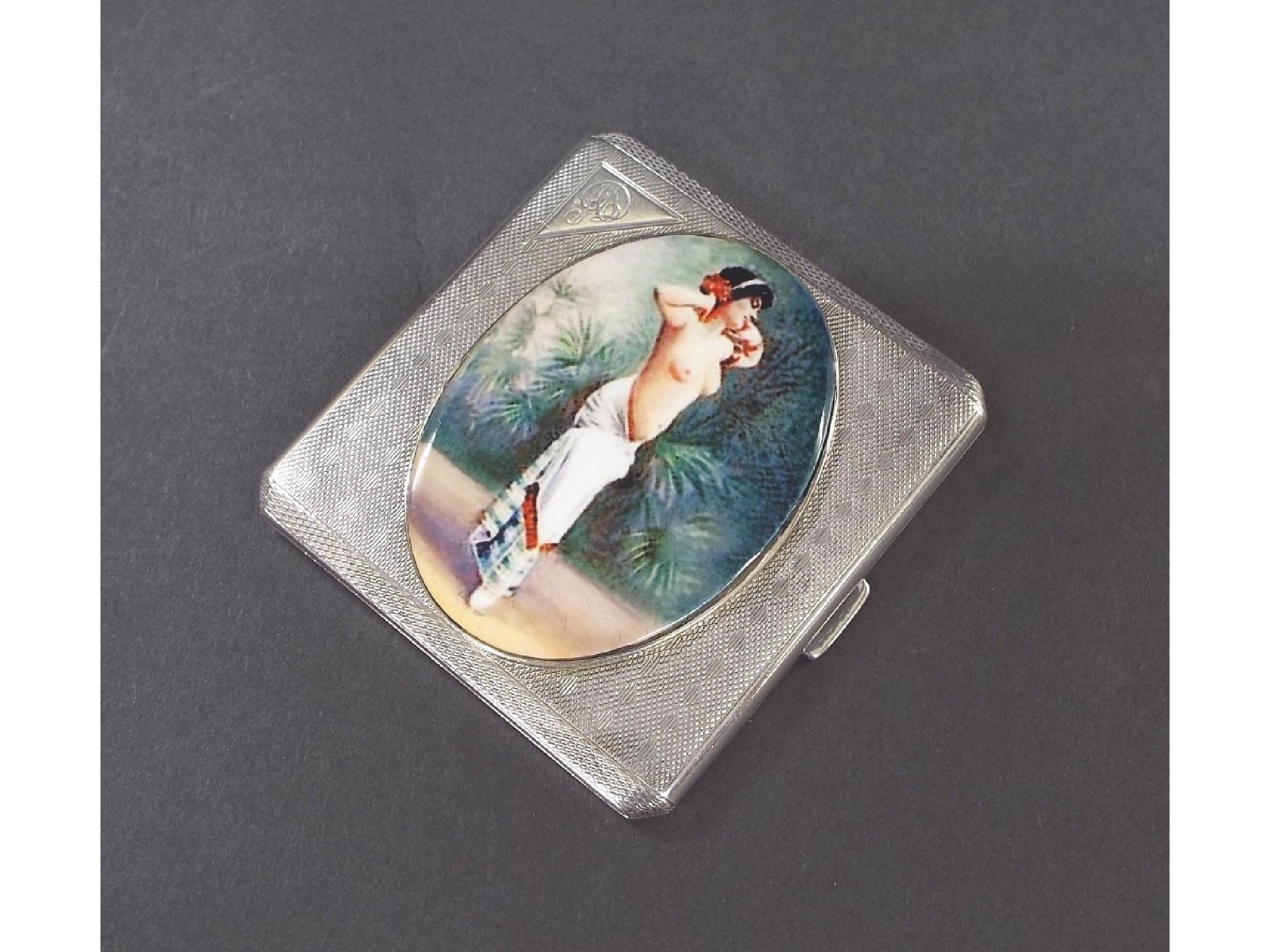 Appraisal: s silver engine turned cigarette case applied with a later