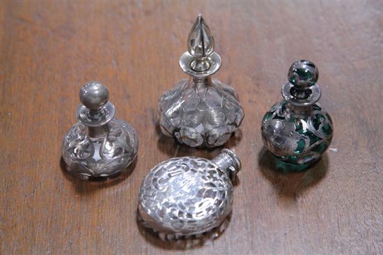 Appraisal: FOUR SILVER OVERLAY PERFUME BOTTLES English and American early th