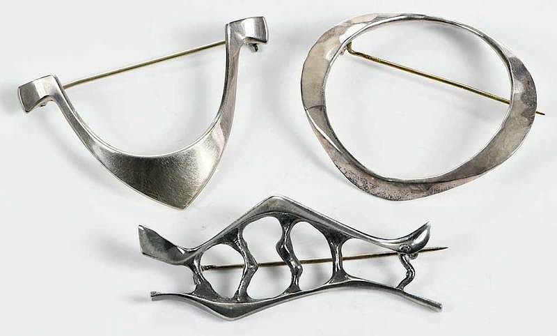 Appraisal: Three Sterling Norwegian Brooches hammered and modernist designs assorted Norway