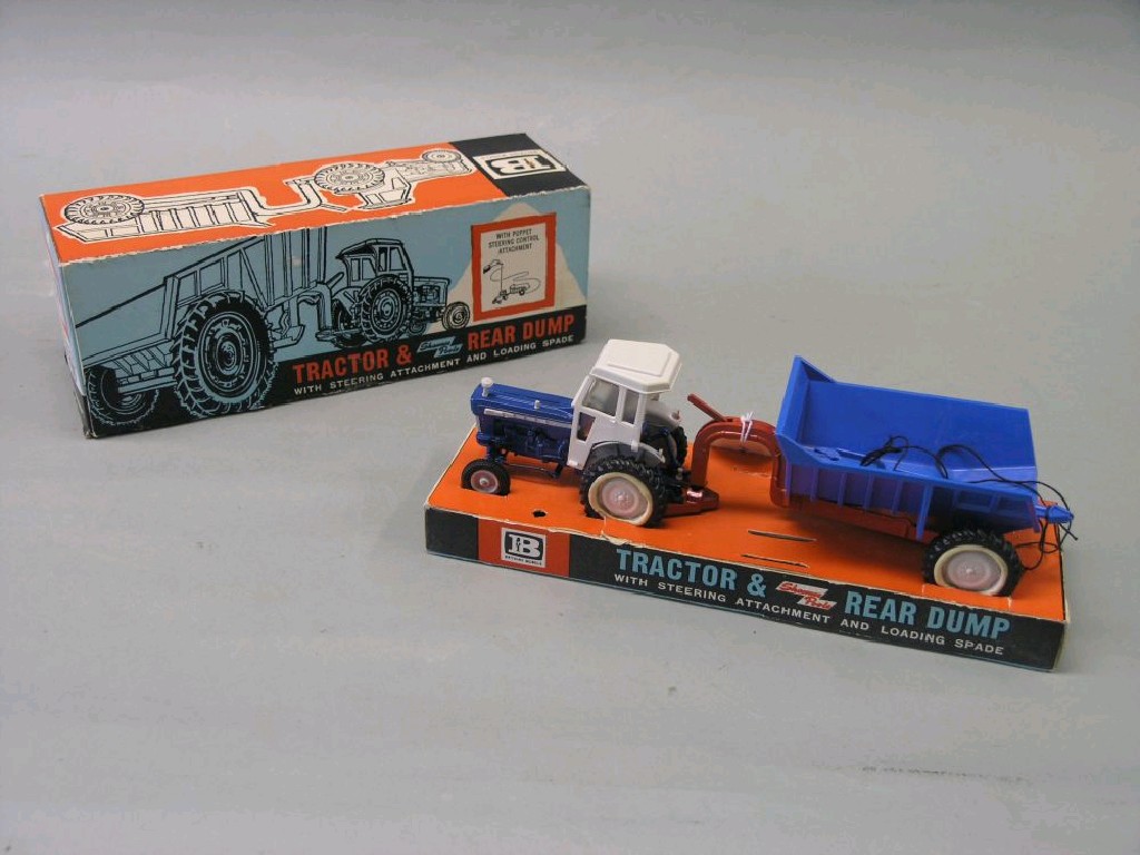 Appraisal: A rare Britains Ford tractor and rear dump trailer die-cast