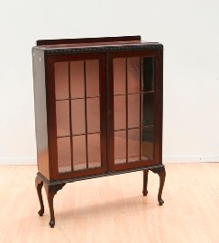 Appraisal: A th century mahogany display side cabinet