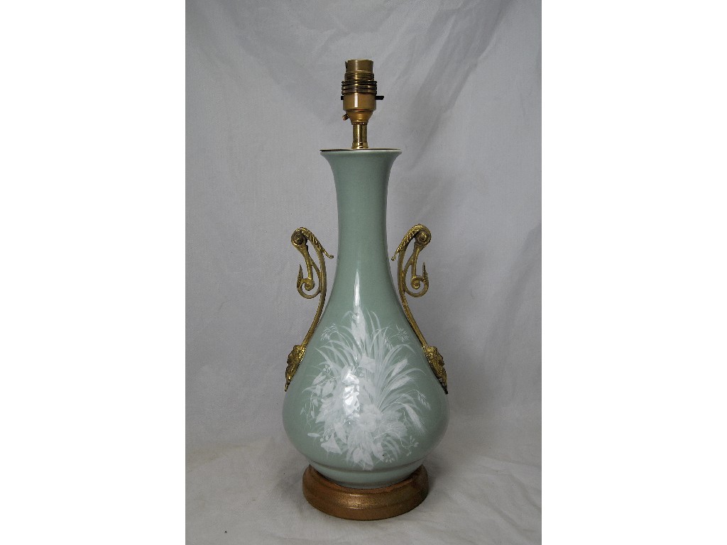 Appraisal: A celadon-glaze vase decorated with pate-sur-pate sprays of grasses and