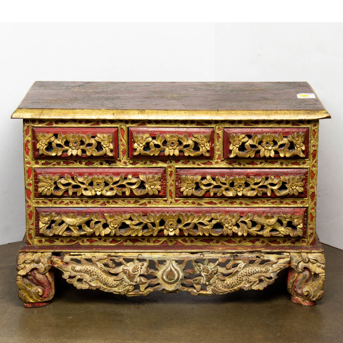 Appraisal: CHINESE GILT LACQUERED AND CARVED CHEST Chinese gilt lacquered and